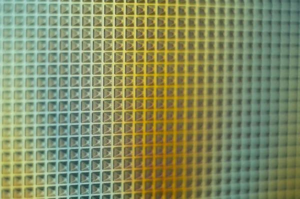 Mavi ve sarı benekli soyut arkaplan.