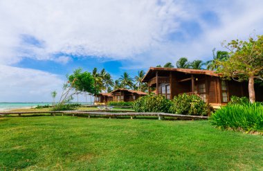  otel gerekçesiyle bungalov rahat, rahat ile görünümünü ayakta plaj ve okyanus yakın evler