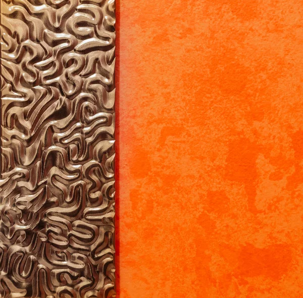 Amazing abstract closeup view of interior orange painted wall with fragment of mirror metal frame part — Stock Photo, Image