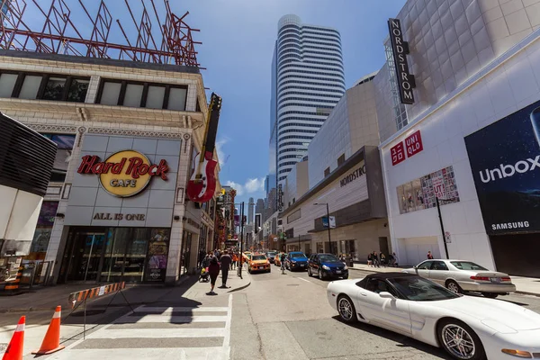 View of down town Toronto young street with various modern buildings and people walking in background — Stock Photo, Image