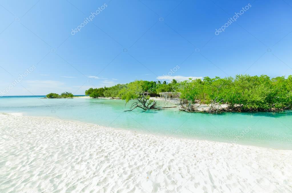 natural landscape amazing view of Cuban Cayo Coco island white sand beach lagoon on sunny gorgeous summer day