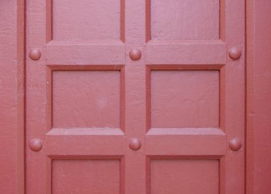 Simple red color square art pattern wooden wall texture background.