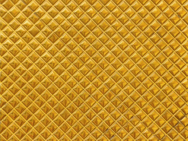 Luxury golden square grid shape tile pattern wall background.