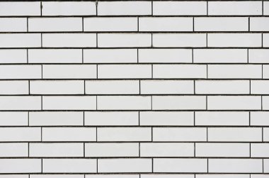 Masonluk beyaz tuğla blokları duvar dokusu yüzey arkaplanını dizer.