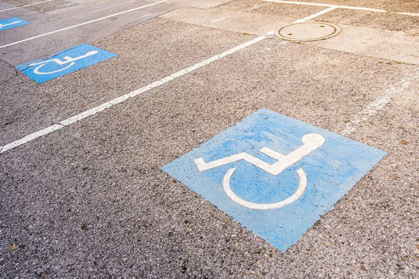 The background of disabled parking permit sign painted on the street, also known as the pavement of handicap with wheelchair parking — Stock Photo, Image