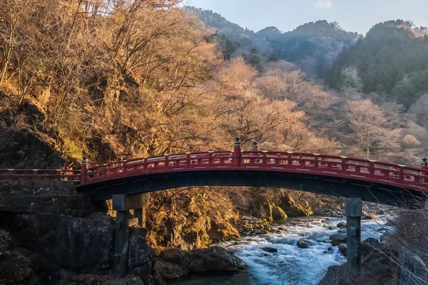 View of Shinkyo Bridge, the red wooden arched bridge with the river in Nikko, a small city in Japans Tochigi Prefecture, in the mountains north of Tokyo, Japan — Stock Photo, Image