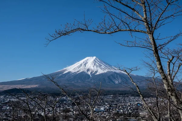 View of Mount Fuji, commonly called Fuji san in Japanese, Mount Fuji's exceptionally symmetrical cone, which is snow capped for about five months a year. It is well known as the symbol of Japan.