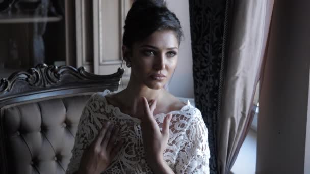 Professional model in lacy dress poses for photo shoot — Stok video