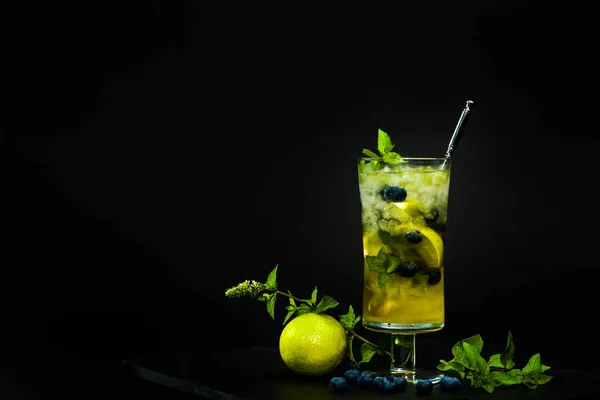 Blueberry mojito on the black background — Stock Photo, Image