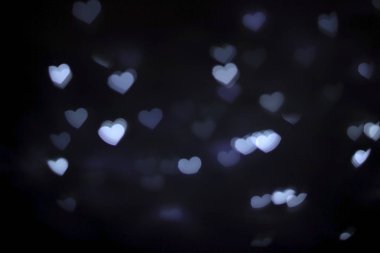 Bulanık mor kalp şekli bokeh arkaplan