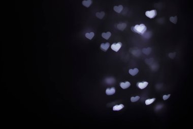 Bulanık mor kalp şekli bokeh arkaplan