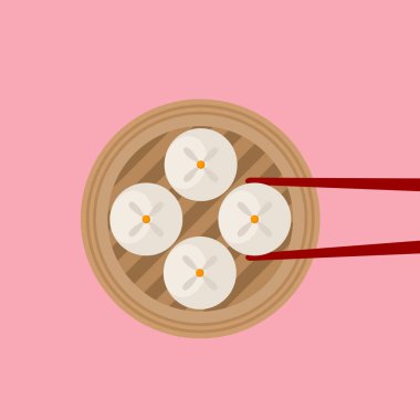 Geleneksel Siopao buğulanmış çörekler ve pembe çubuklar.