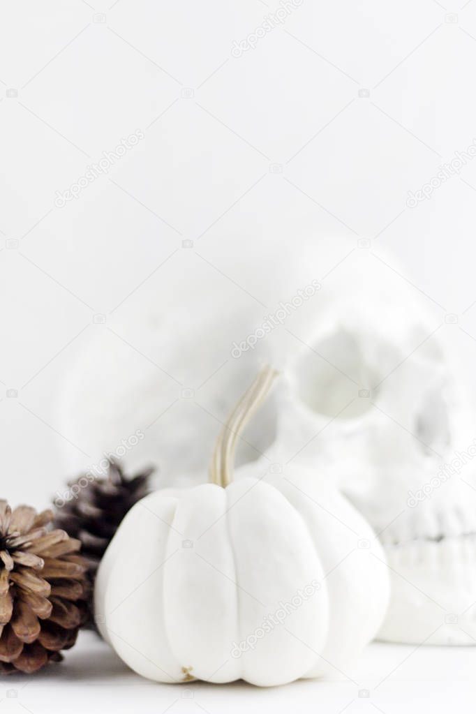 Minimal white halloween skull set design