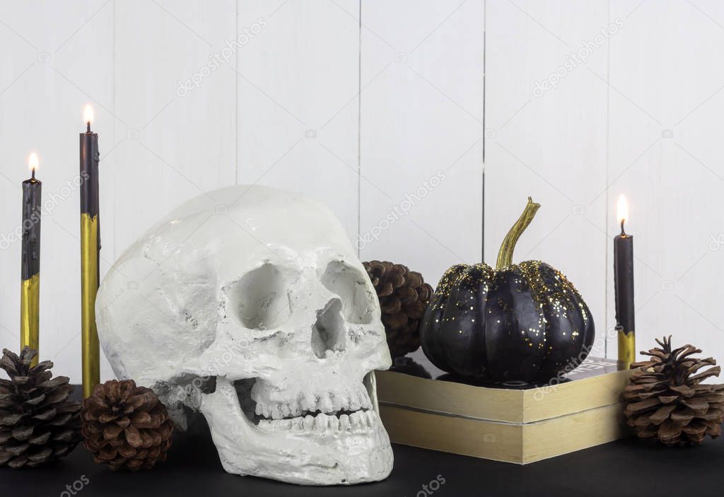 Dark halloween set with white skull and black fancy pumpkin