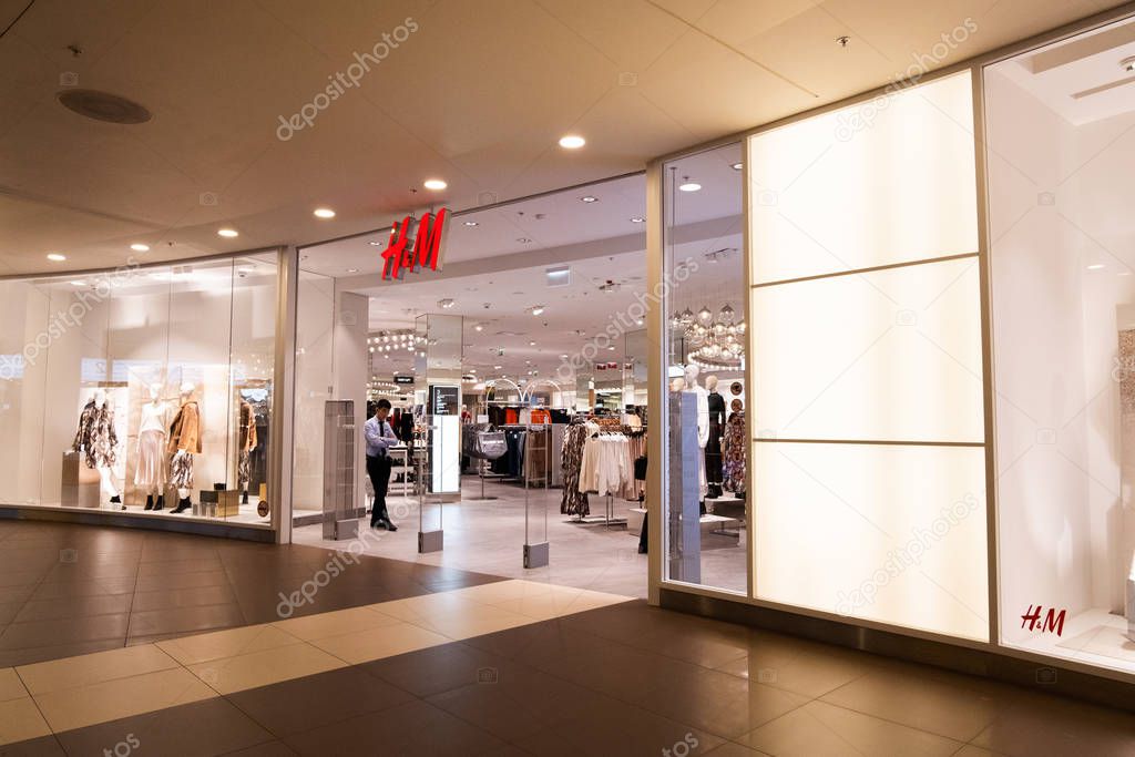 H&M store in Galeria Shopping Mall in Saint Petersburg, Russia. Hennes & Mauritz AB is Swedish multinational clothing-retail company known for its fast-fashion clothing