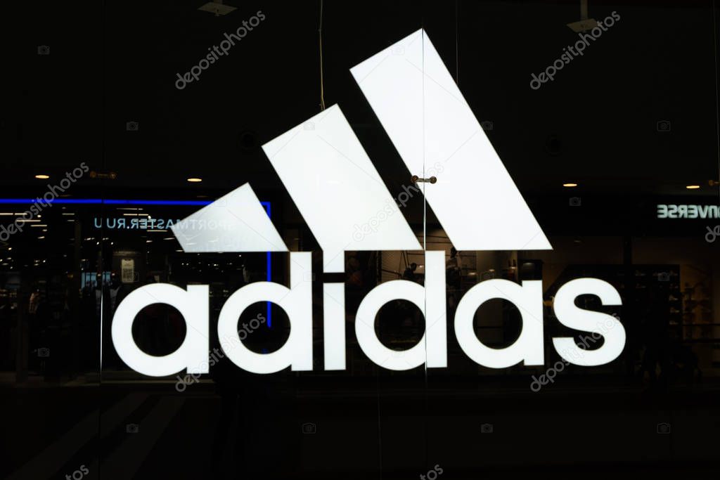 Adidas store in Galeria Shopping Mall in Saint Petersburg, Russia. Adidas is a multinational corporation, founded and headquartered in Herzogenaurach, Germany,