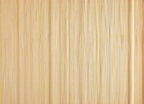 Yellow sushi Mat made from natural bamboo — Stock Photo, Image