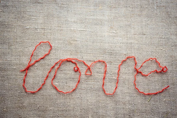 Sevgililer Günü arkaplanında sevgili için aşk yazılıydı. — Stok fotoğraf