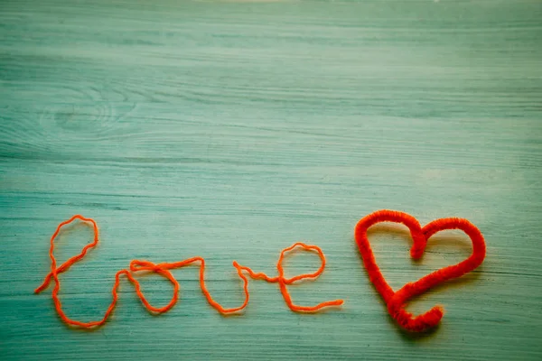Valentine's day background with the inscription Love for a dear — Stock Photo, Image