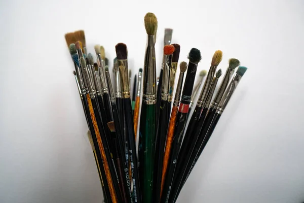 Set Paint Brushes Light Wall Background Place Text — Stock Photo, Image