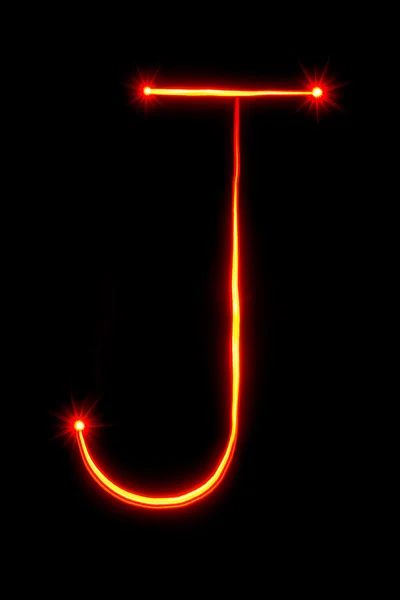 Red light painting letter J — Stockfoto