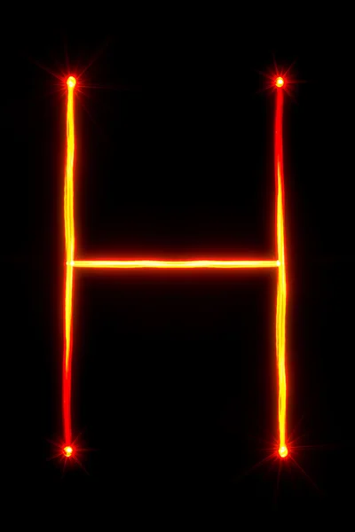 Red light painting letter H — Stock Photo, Image