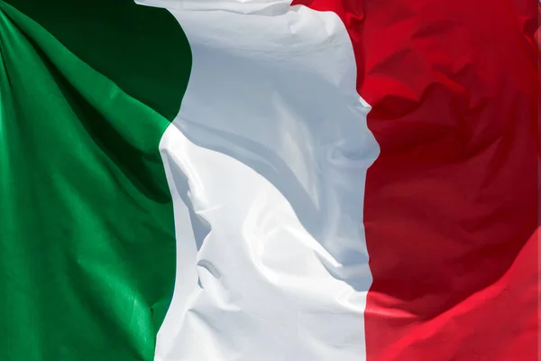 Italian flag floating in the wind — Stock Photo, Image