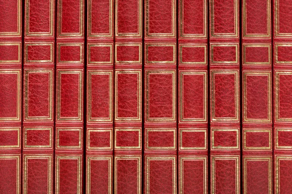 Vista Cercana Los Clásicos Libros Cerrados Rojos Dorados Una Fila —  Fotos de Stock