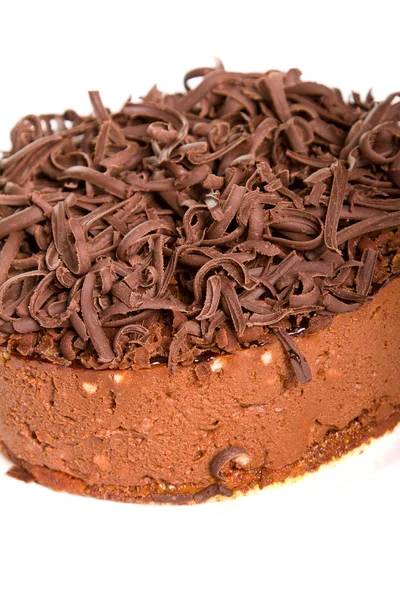 Chocolate cake with decorative chocolate shavings/flakes — Stock Photo, Image