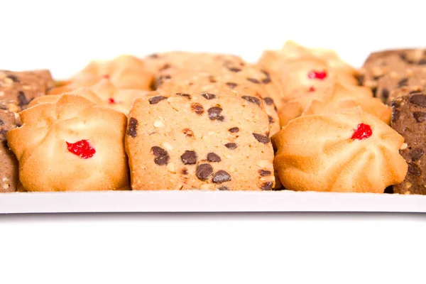 Diversi tipi di biscotti su un piatto di portata — Foto Stock