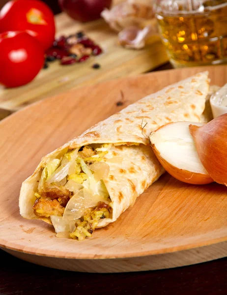 Traditional tortilla on a wooden plate — Stock Photo, Image