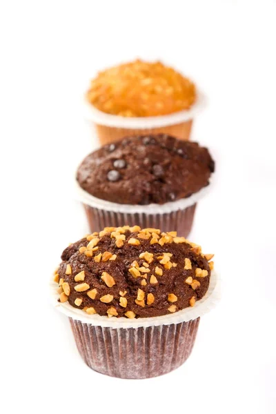 Muffins em terreno de panificação branco — Fotografia de Stock