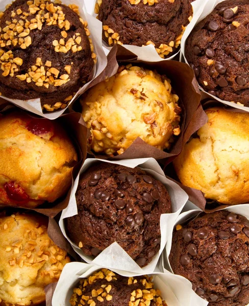 Různé typy muffiny střílel z výše — Stock fotografie