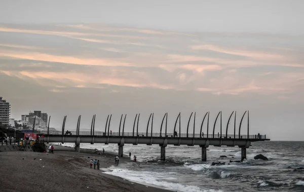 Beautiful Umhlanga Promenade Pier a whalebone made pier in Kwazulu Natal Durban North South Africa during sunset — Stock Photo, Image