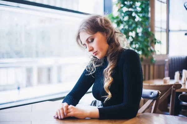 The girl in the cafe, a student or a Manager, meeting with friends in cafes, coffee, and coffee break