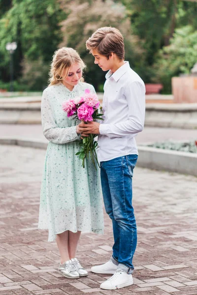 Man Gives His Beloved Girl Flowers Peonies Declaration Love Proposal — Stock Photo, Image