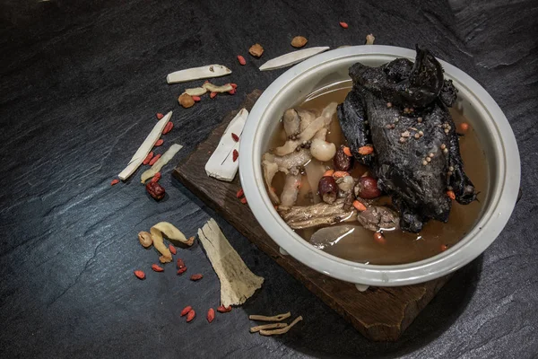 Chinese traditional nourishing health stew, stewed black bone ch