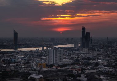 Bangkok, thailand - Mar 06, 2020 : Beautiful view of Bangkok city, Beauty skyscrapers along Chaopraya river in the evening, making the city modern style. Selective focus.