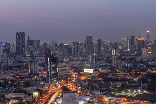 Bangkok, thailand - Mar 06, 2020 : Sky view of Bangkok with skyscrapers in the business district in Bangkok in the evening beautiful twilight give the city a modern style. Selective focus.