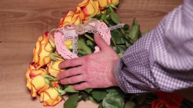 A wonderful bouquet of orange roses for your loved one. Romantic evening. Surprise for a loved one. Love and romance.