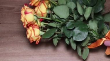 A wonderful bouquet of orange roses for your loved one. Romantic evening. Surprise for a loved one. Love and romance.