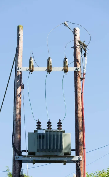 Power transformer and lines with blue sky — Stock Photo, Image