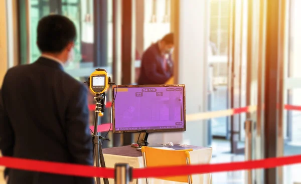 thermoscan camera at screening points at the entrance of shopping mall to preventive measures against the spread of the COVID-19 virus out of concern for the well-being and safety of customer