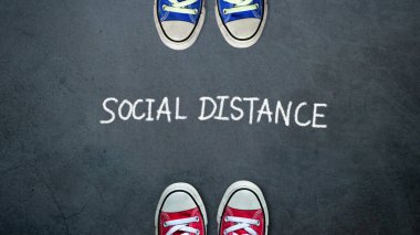 Social distance. two people keep spaced between each other for social distancing, increasing the physical space between people to avoid spreading illness during transmission of COVID-19 outbreak clipart