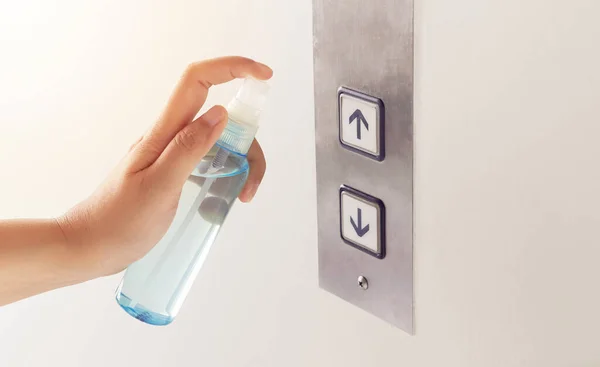 Disinfect Sanitize Hygiene Care People Using Alcohol Spray Elevator Button — Stock Photo, Image