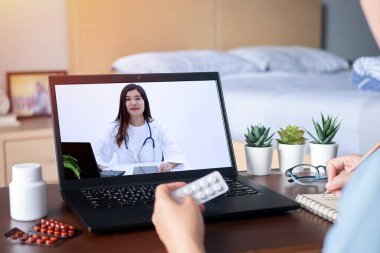 sick woman use video conference, make online consultation with doctor via laptop computer, patient ask doctor about illness and medication via video call. Telehealth, Telemedicine and online hospital clipart