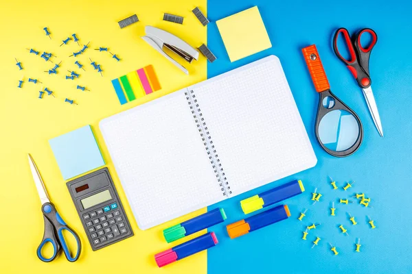 Back to school. School supplies and stationery on color background.