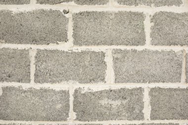 Beton selvi ağacından yapılmış boş tuğla zemin. Tuğla duvar pürüzsüz desen.