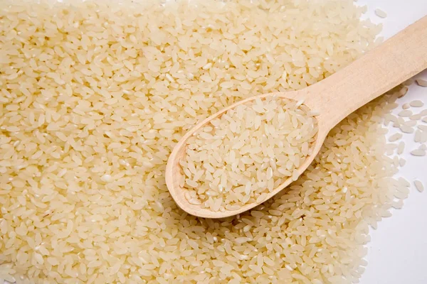 Arroz Blanco Con Una Cuchara Madera Sobre Una Pila Arroz —  Fotos de Stock