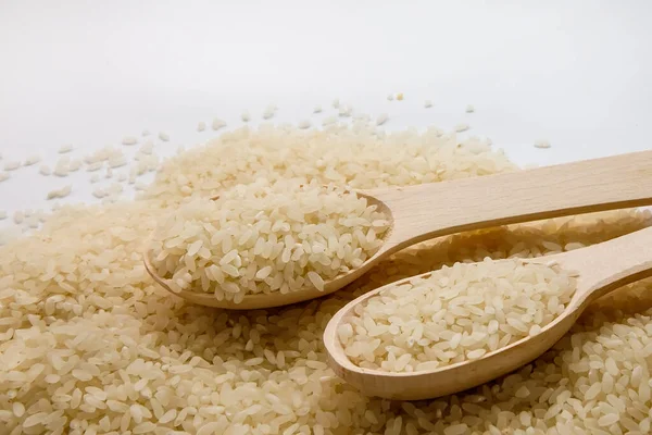 Arroz Blanco Con Una Cuchara Madera Sobre Una Pila Arroz —  Fotos de Stock